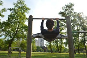 Young man exercising in park