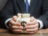 Money bag in a hand