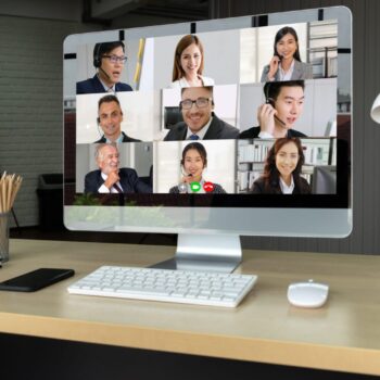 Video call business people meeting on virtual workplace or remote office. Telework conference call using smart video technology to communicate colleague in professional corporate business.